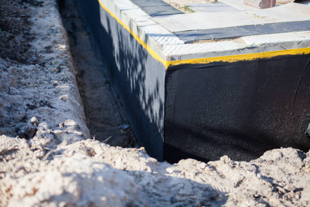 Professional Waterproofing technician working in Skokie, IL